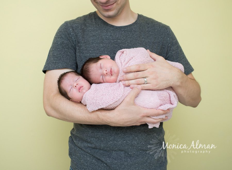 Twin Newborn Session In Dads Arms Photo