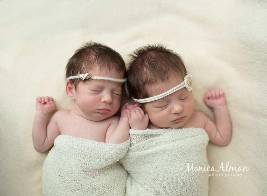 Twin Newborn Session Babies Holding Hands Photo