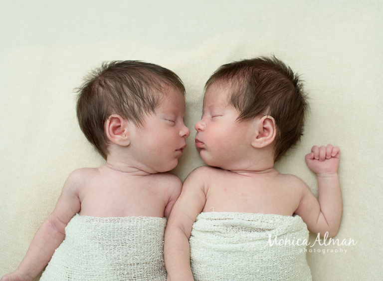 Twin Newborn Session Babies Looking at Each Other Photo