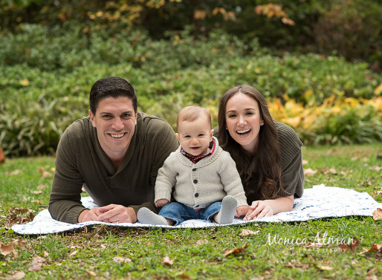 Nine Month Old Session family laying on ground photo