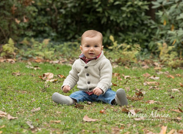 Nine Month Old Sitting On Ground Photo