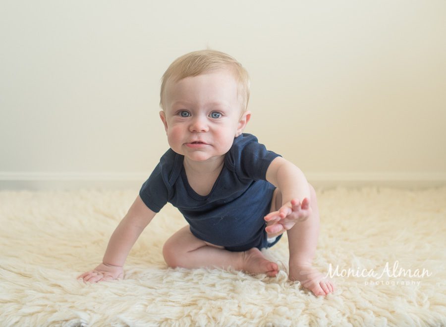 Baby Boy Milestone Session Playing on Rug Photo