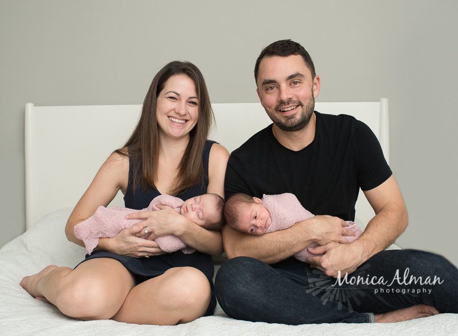 Twin Sisters Parents Smiling Photo