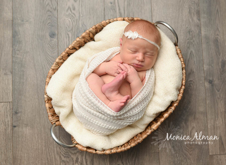 It's-a-girl-baby-in-a-basket-photo