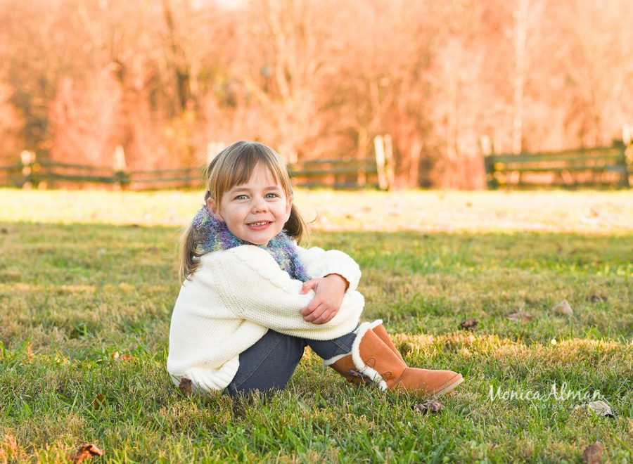 Family-session-on-the-farm-girl-posing-photo