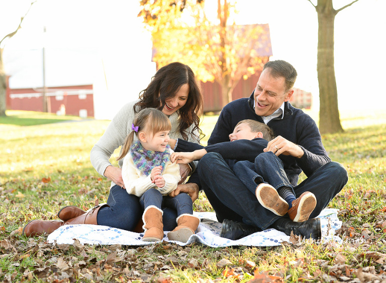 Family-session-on-the-farm-kids-laughing-photo
