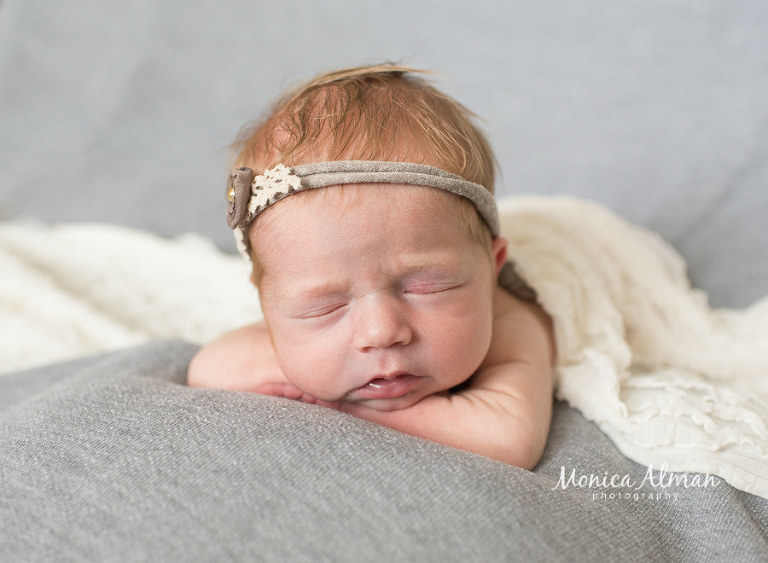 Maryland newborn photographer baby lying on belly photo