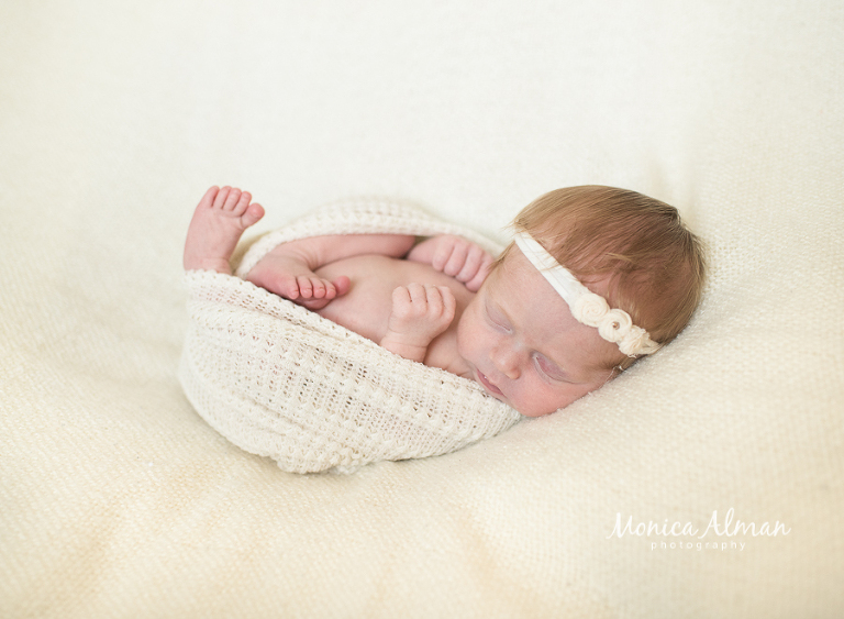 Maryland newborn photographer baby girl in a headband photo