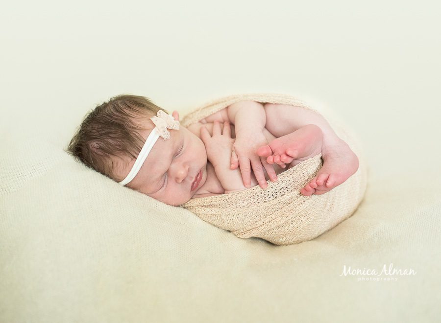 Baby Sister Posed in Wrap Photo