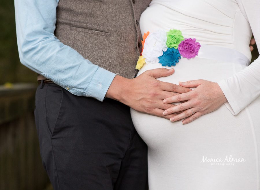Rainbow Baby Maternity Session Parents Touching Belly Photo