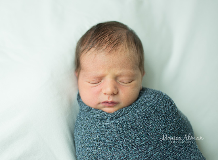 Baby brother swaddled photo