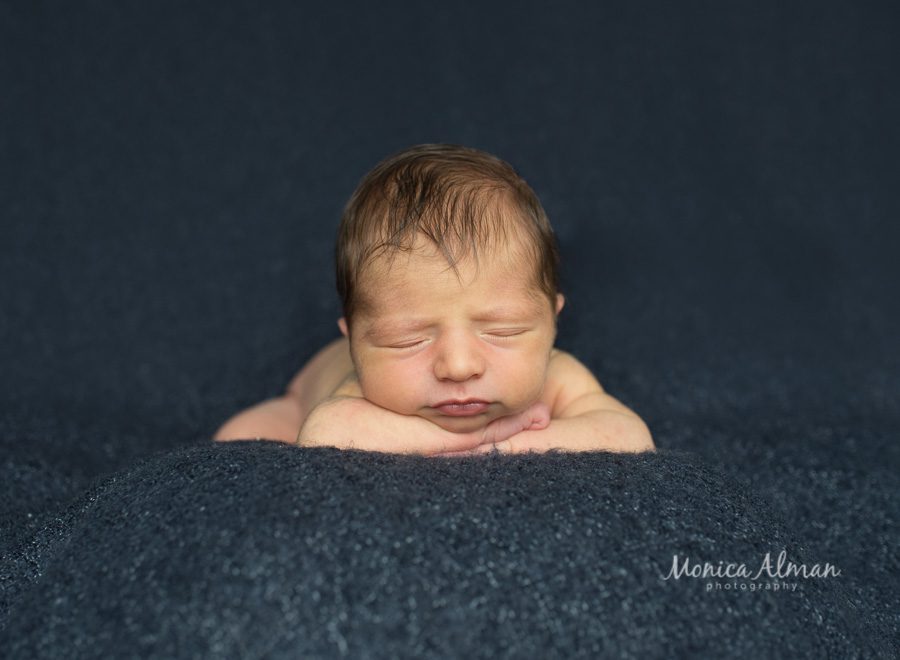 Baby brother baby on hands photo