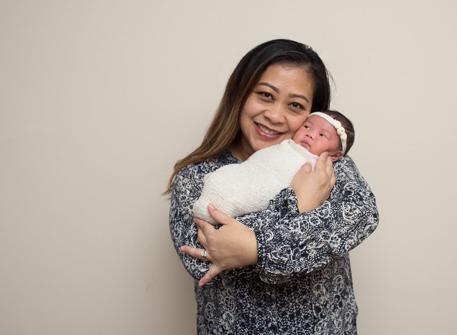 Newborn Photography Session mom smiling with baby photo