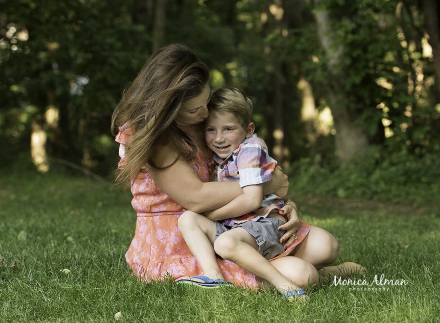 Spring Family Portraits mom hugging son