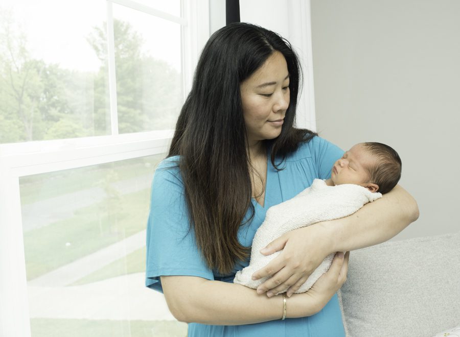 Lifestyle Newborn Photography Posed by Window
