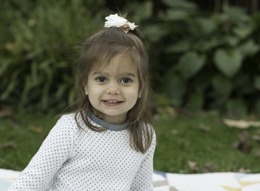 child smiling for photographer