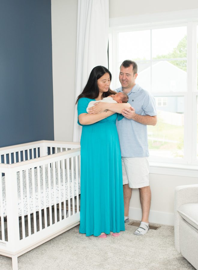 Baby with parents in their home portraits