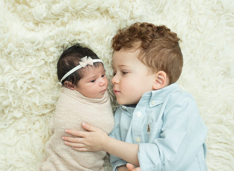 image of baby girl with older brother
