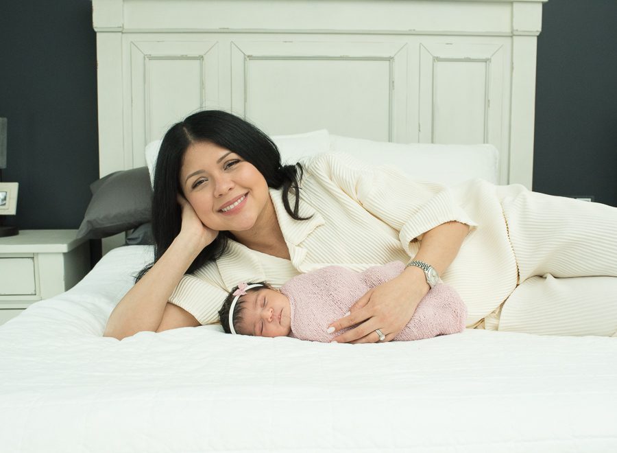 image of mom with new baby photo