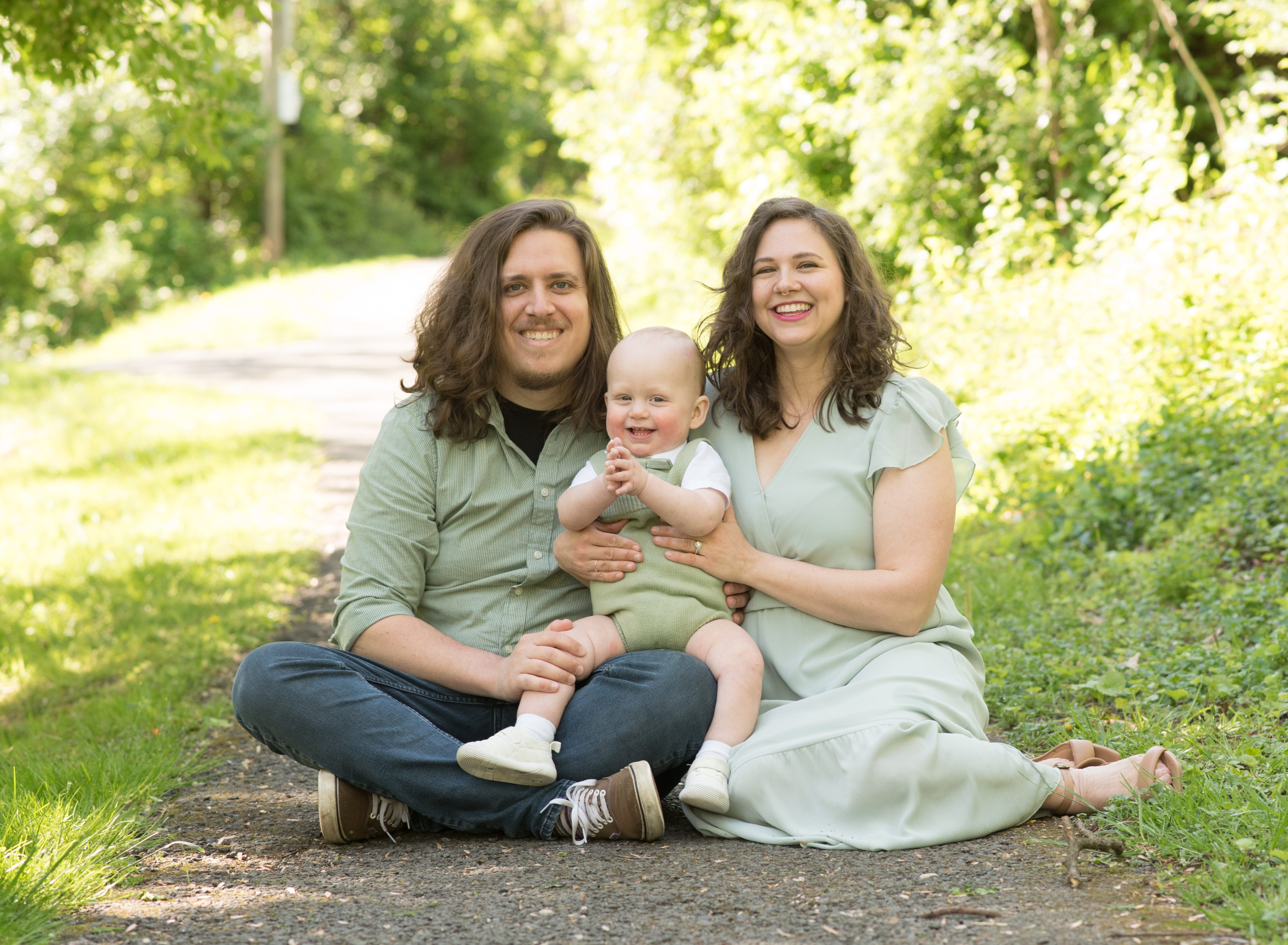 Baby boy with his parents during his photo session in Rockville Maryland