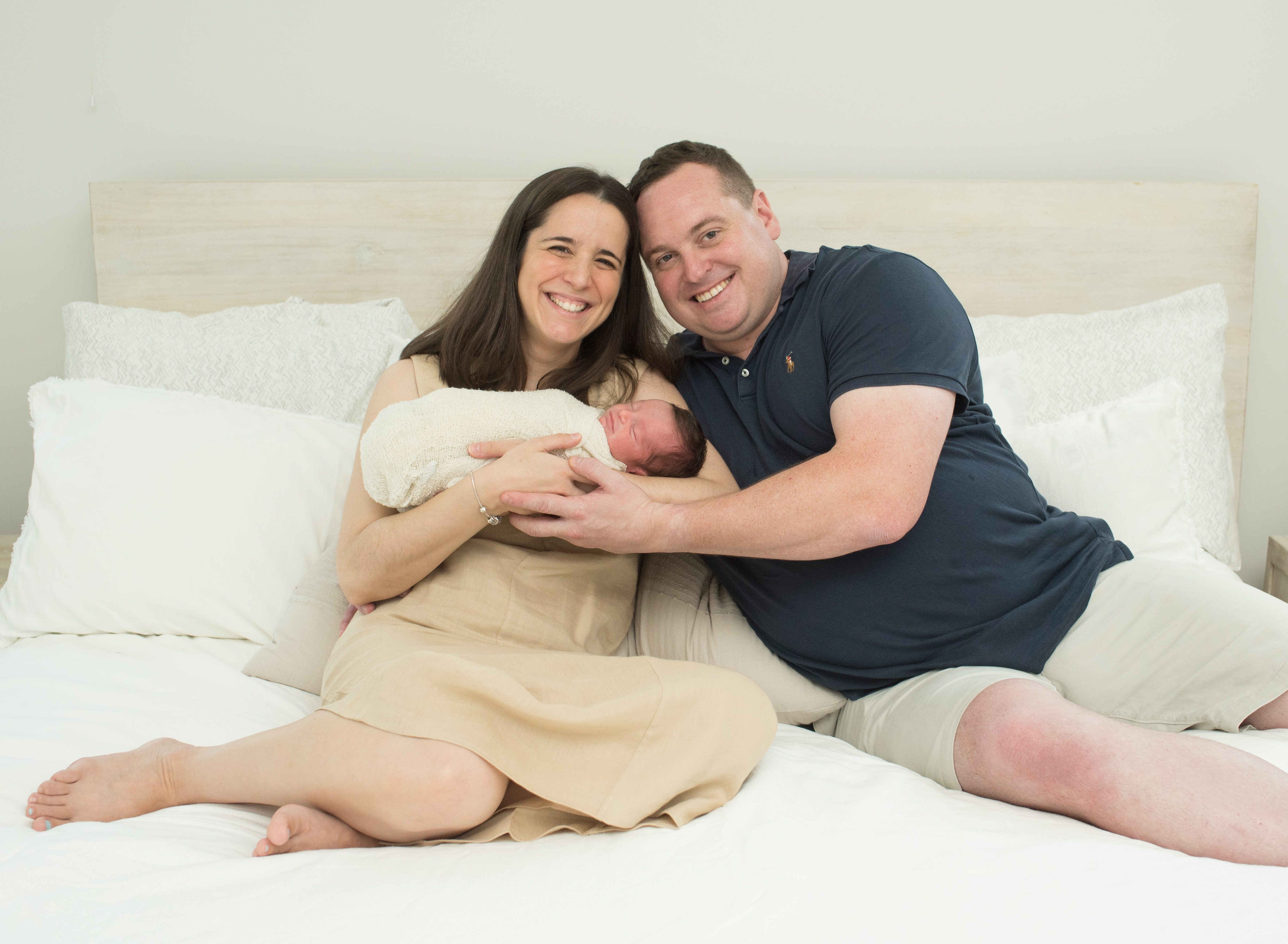 happy parents with new baby photo