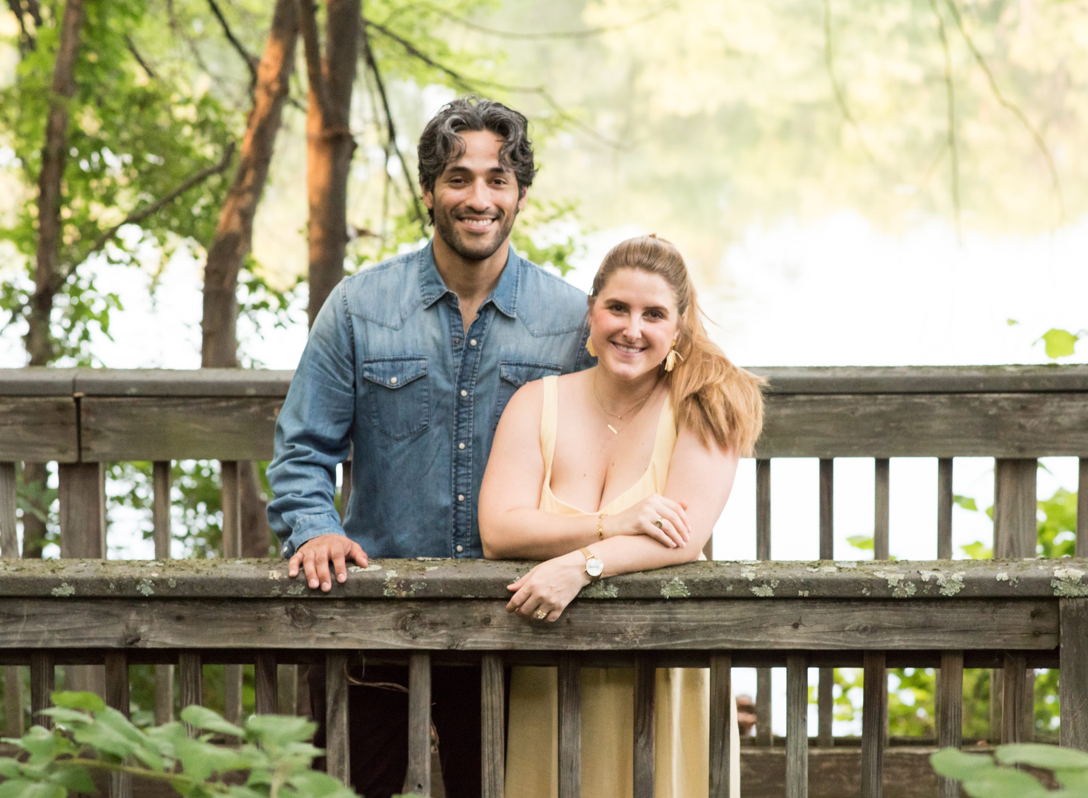 couple photographed on a bridge