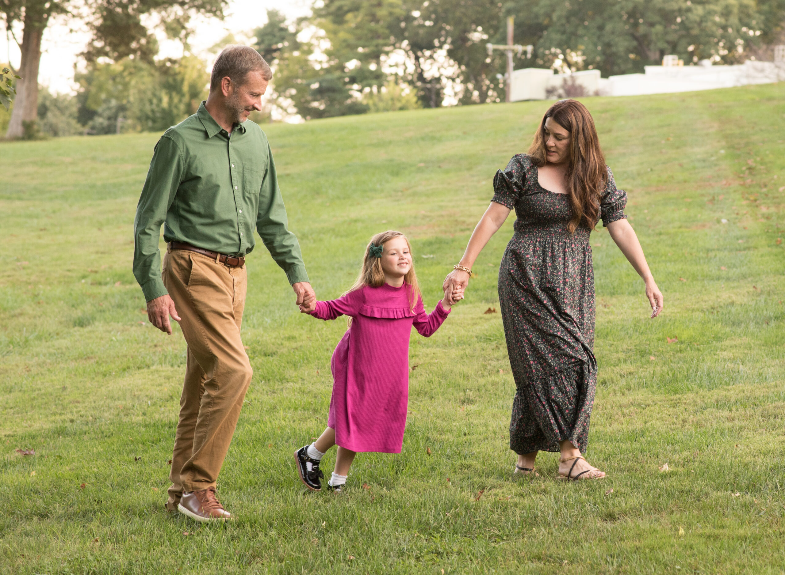 family walking together during photo session in maryland