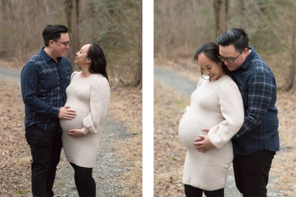 mom and dad looking at the baby bump and each other photo