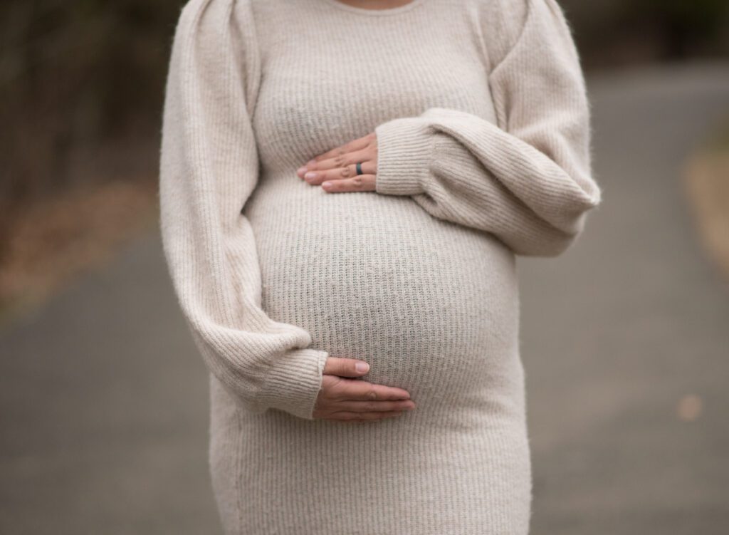 baby bump of pregnant mom photo